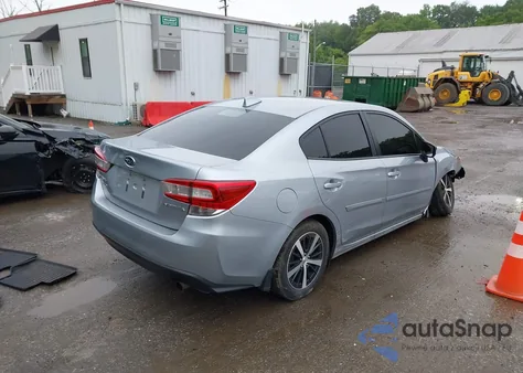 2021 Subaru Impreza Premium from USA, damaged, VIN 4S3GKAV62M3606531